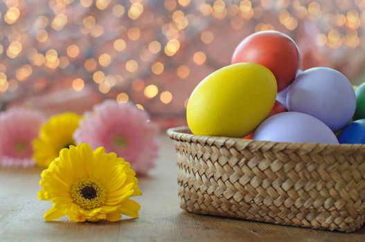 Easter eggs inside a wicker basket 