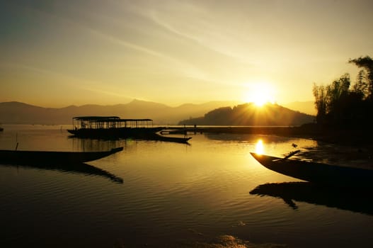 Beautiful landscape with sunset on lake