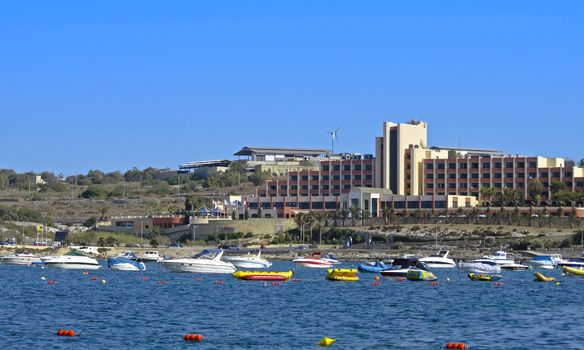 Salina Bay in the north-western part of mainland Malta and tourist facilities in the background - Bugibba, Malta