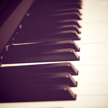 Close up of piano keys with retro filter effect