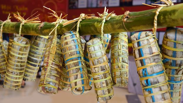 Group of traditional Vietnamese food - banh tet ( cylindric glutinous rice cake) for Vietnam Tet just boiled, this kind of cake is special,cultural food in Viet nam culinary culture 