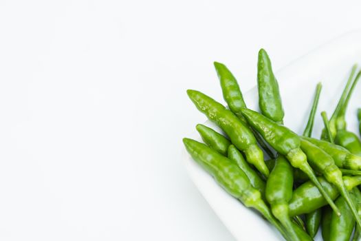 Green peppers in close up on white background