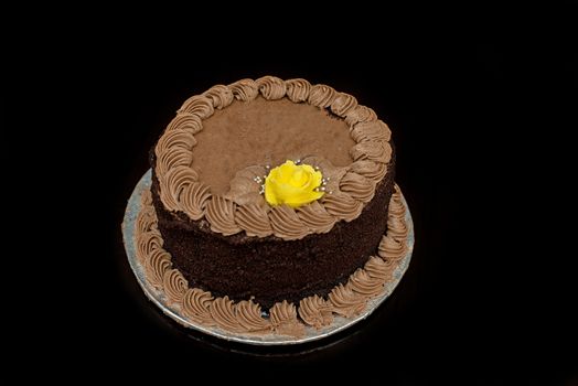 Chocolate cake isolated on a black back ground