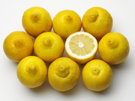 tasty ripe lemon background, top view