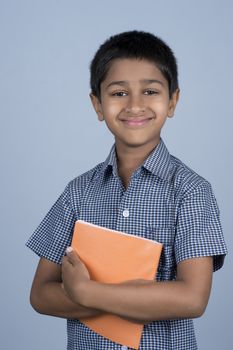 Handsome Indian toddler ready to go to school