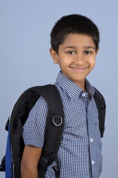 Handsome Indian toddler ready to go to school