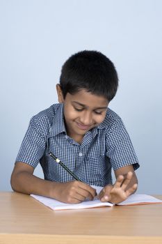 Handsome Indian toddler ready to go to school