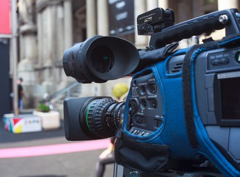 Close up of video camera in action