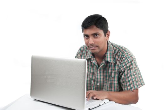 an old Indian man surfing the net after retirement