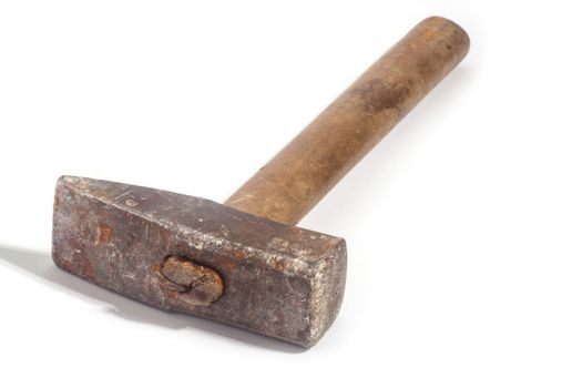 Close up of dirty hammer on white