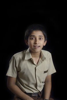 Portrait of an handsome young indian kid smiling 