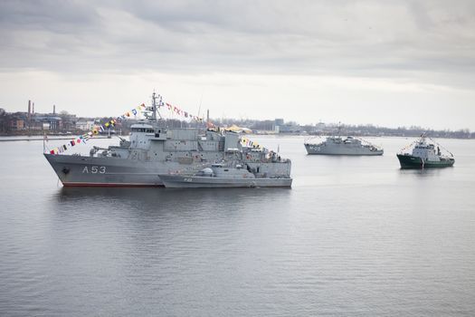 RIGA, LATVIA ��� NOVEMBER 18 2011:Latvian Naval Forces ships in river Daugava during parade of anniversary of establishment of the Republic of Latvia.