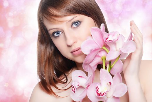 Beautiful Girl With Orchid Flowers