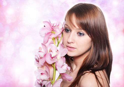 Beautiful Girl With Orchid Flowers