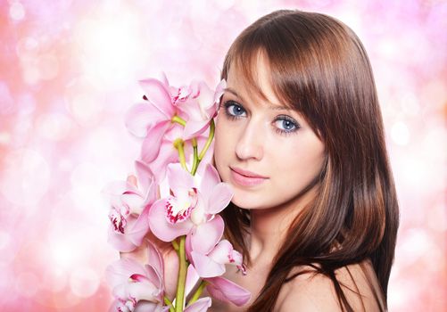 Beautiful Girl With Orchid Flowers