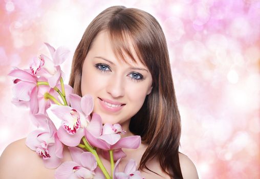 Beautiful Girl With Orchid Flowers