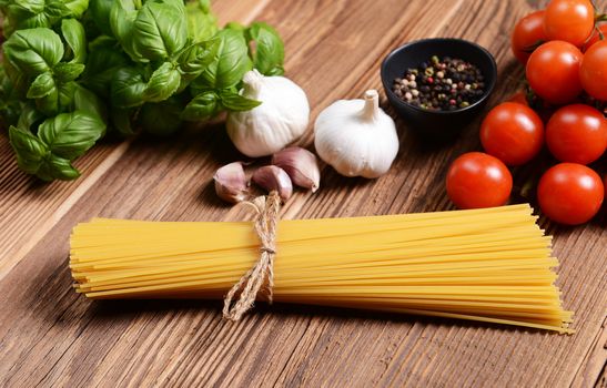 spaghetti pasta on wooden background