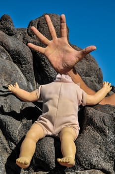 No Head Doll on the Volcanic Rocks