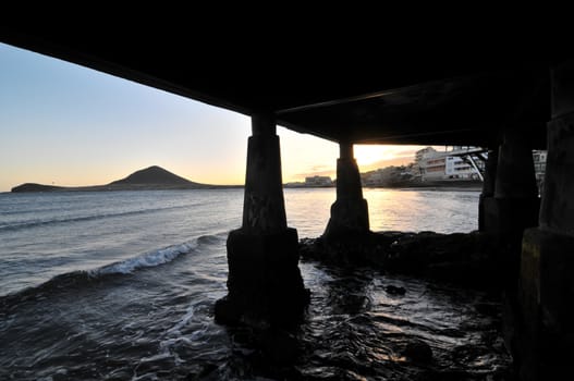 Sunset on the Atlantic Ocean with a Mountain in Background El Medano Tenerife Canary Islands Spain