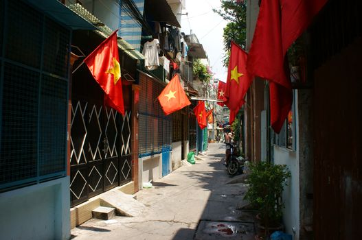 Vietnamese flag fly on holliday in city