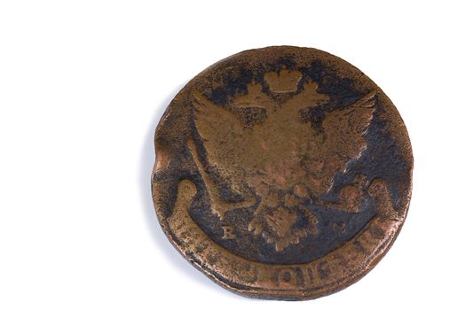 Antique copper coin 5 kopecks with the image of the coat of arms of the Russian Empire..