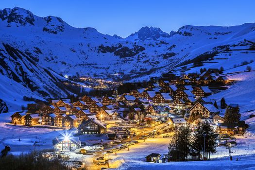 View of Saint Jean d'Arves village by night in winter, France