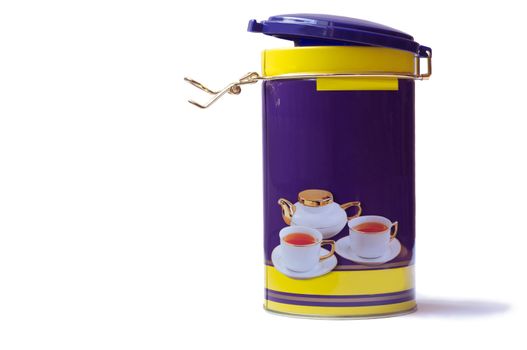 Box with a tight-fitting lid for storing tea decorated with an image of a kettle and cups. Presented on a white background.
