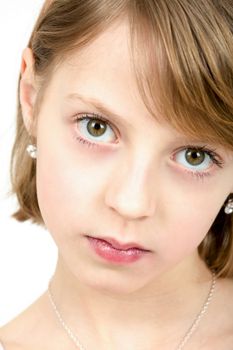 Studio portrait of young beautiful girl with nice eyes on white background