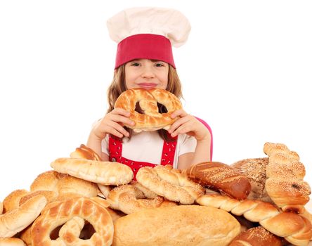 little girl cook hold pretzel