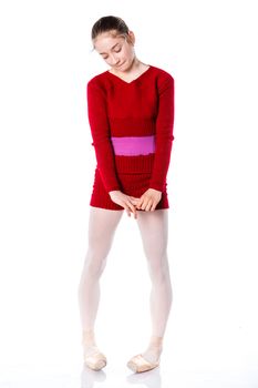Beautiful young ballerina on a white background
