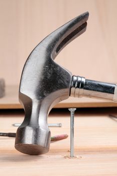 detail of a nail and a hammer