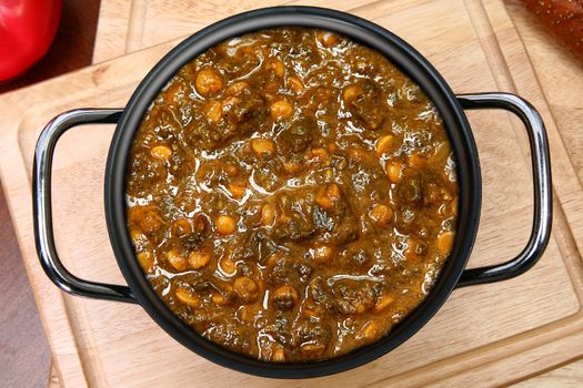 Pot of Indian Spinach Dal Cuisine on Table