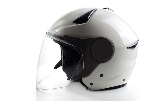 Glossy white quad ATV helmet isolated on background