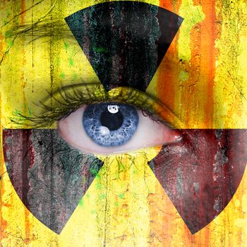 Radioactive background painted on woman face with blue eye