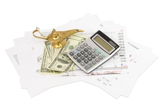 Dollars, calculator, graphics and the lamp of Aladdin. Business concept