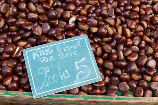 Chestnuts for sale on Provence market, South France, Luberon region