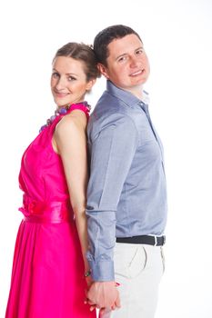 Happy couple. Attractive man and woman being playful. Isolated on white background.