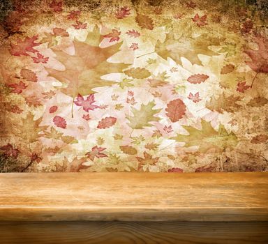 Empty wooden deck table with autumn background. Ready for product display montage.