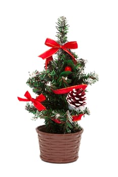 a small Christmas tree on a white background