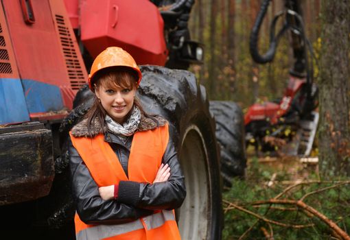 Young and beautiful forestry engineer at work