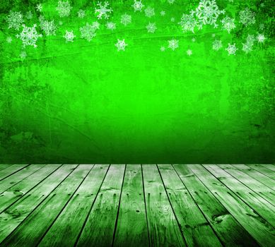 green christmas background with snowflakes