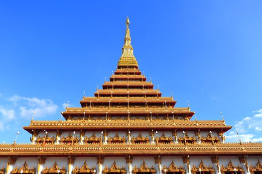 Golden pagoda blue sky in Thailand