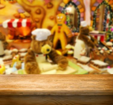 Christmas holiday background with empty wooden deck table and santa claus home 