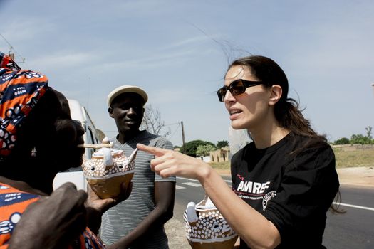 MATAM,SENEGAL-CIRCA NOVEMBER 2013:Actress Caterina Murino meets the women of the local villages.