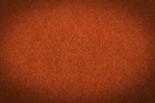 Orange paper with vignette, a background or texture