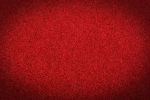 Red paper with vignette, a background or texture