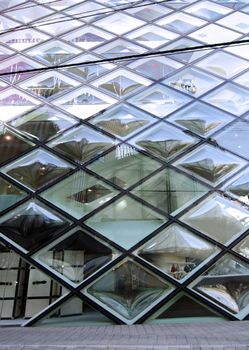 Rhomboid-grid glass building in tokyo, japan