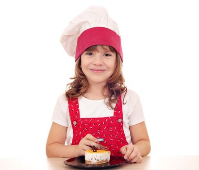 beautiful little girl cook eat cake
