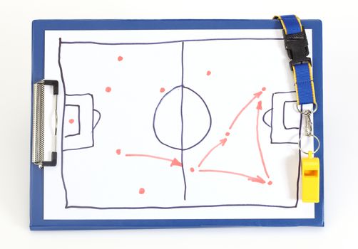 Clipboard with soccer tactical plan on white