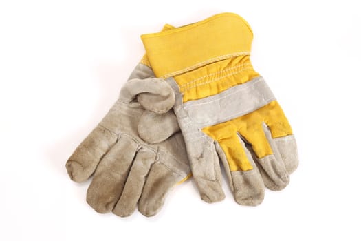 Works yellow protective gloves on white